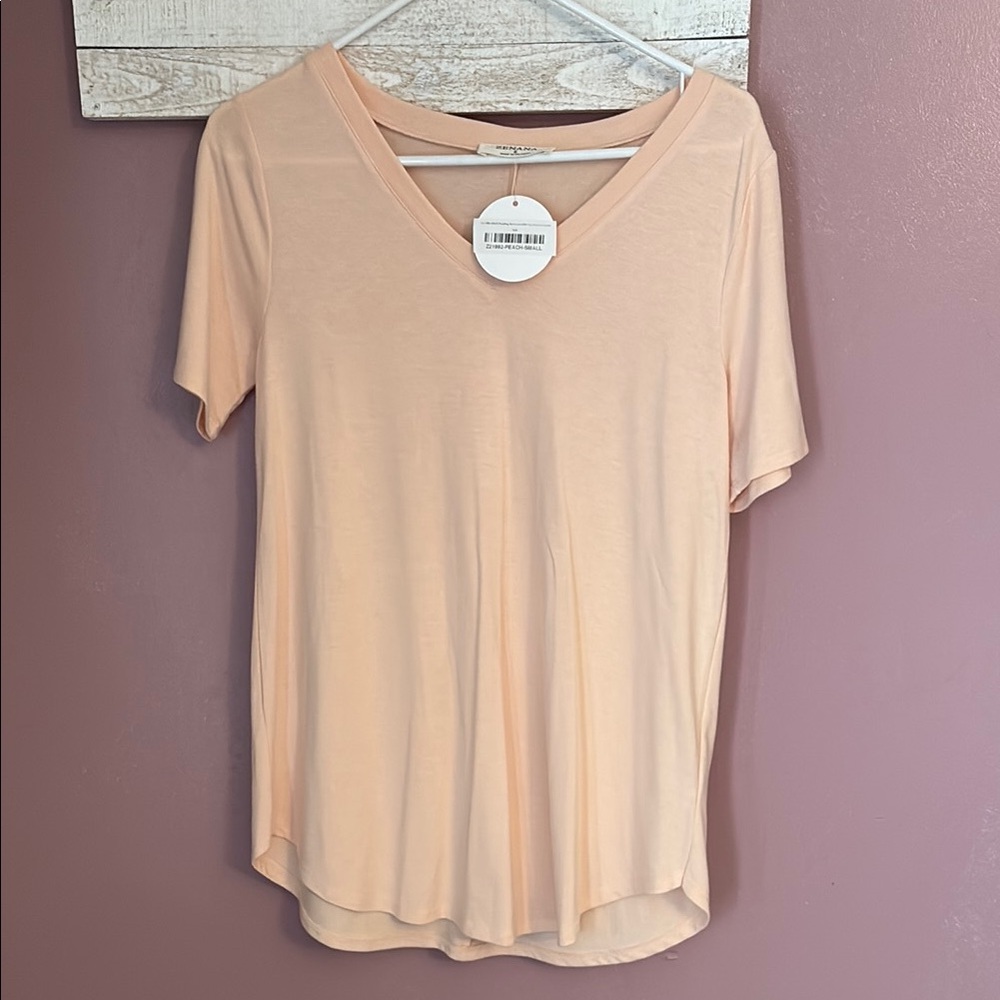 Women’s size small short, sleeved blouse.